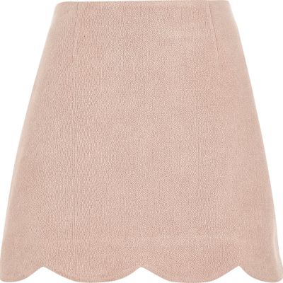 Pink faux suede scallop hem mini skirt